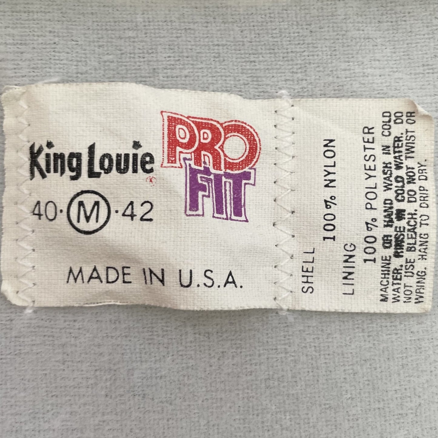 80s vintage 古着 ビンテージ スタジャン King Louie キングルイ USA製 刺繍ロゴ シルバー ナイロン アメカジ アメリカ製