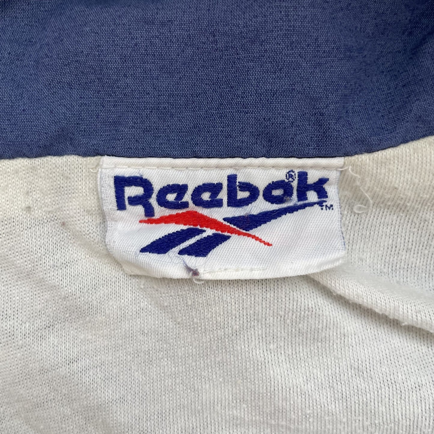 90s vintage 古着 ビンテージ リーボック Reebok 総柄 ナイロン トラックジャケット ワンポイントロゴ刺繍 くすみブルー