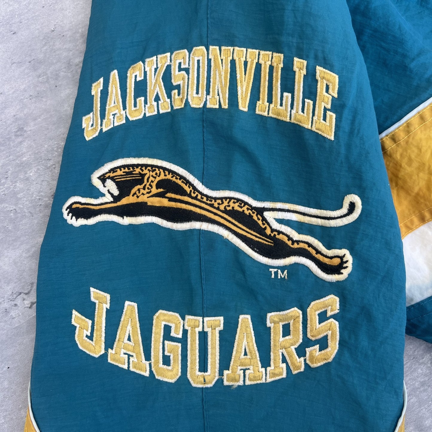 90’s STARTER スターター NFL JAGUARS 中綿ジャケット 刺繍 ワッペン フットボール 古着