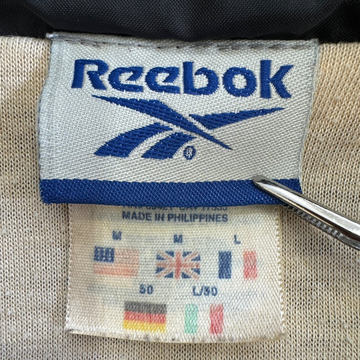 Reebok リーボック ナイロンジャケット 万国旗タグ 刺繍ロゴ サイズM ~L フィリピン製